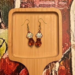 Gold and Brown Dangle Earrings with Intricate Design